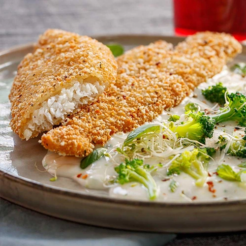 Milanesa de merluza a las finas hierbas
